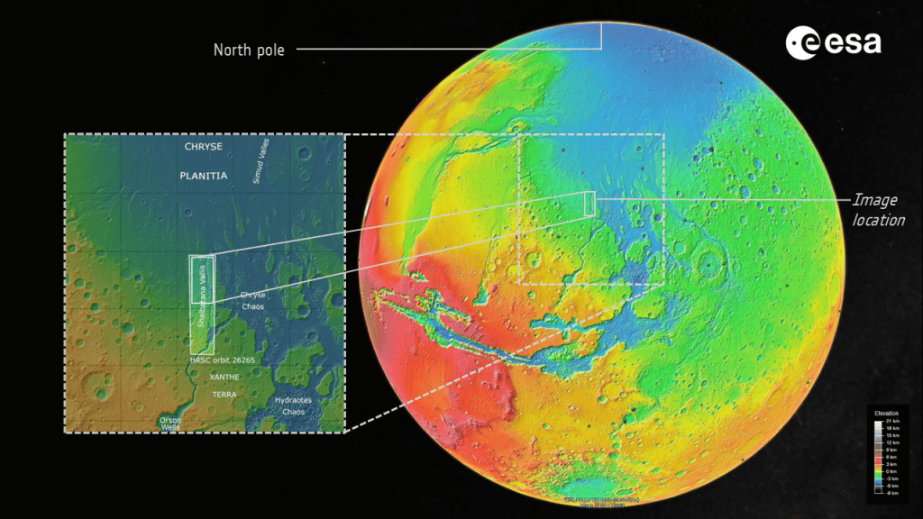 Mapa colorido de Marte mostrando a localização de Shalbatana Vallis próximo ao equador do planeta. Quadros e linhas destacam a área registrada pela sonda Mars Express em relação ao restante da superfície marciana.